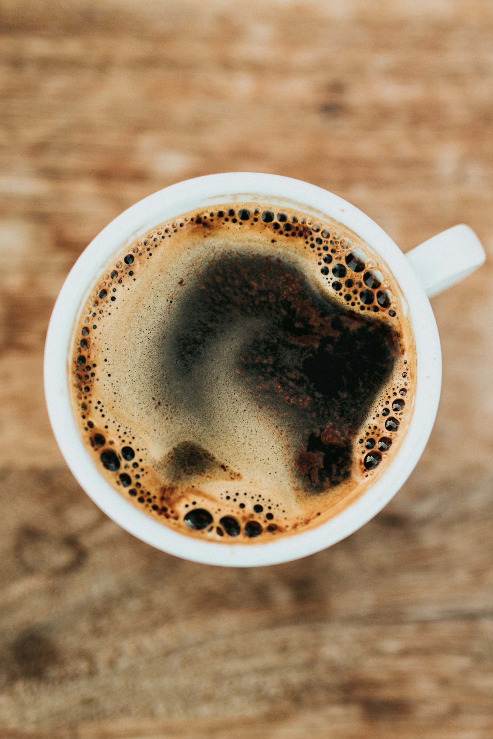 Fresh black coffee with crema